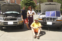 two solar-electric cars